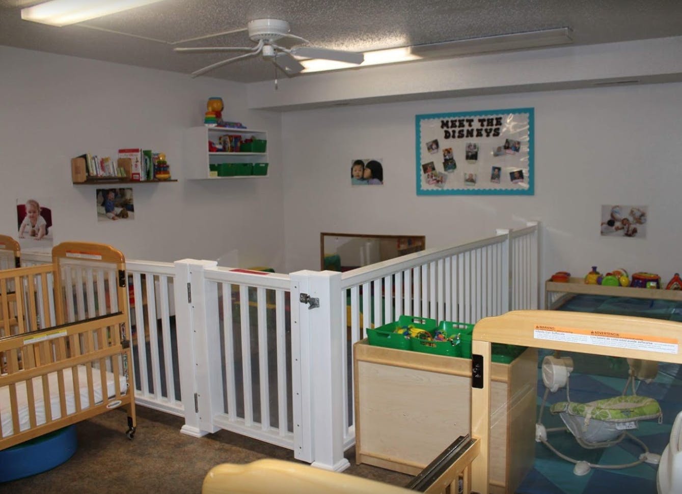 Nursery room with cribs and a playpen