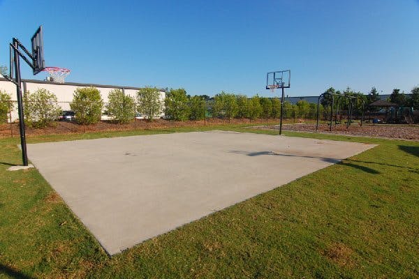 Outdoor basketball court with two hoops
