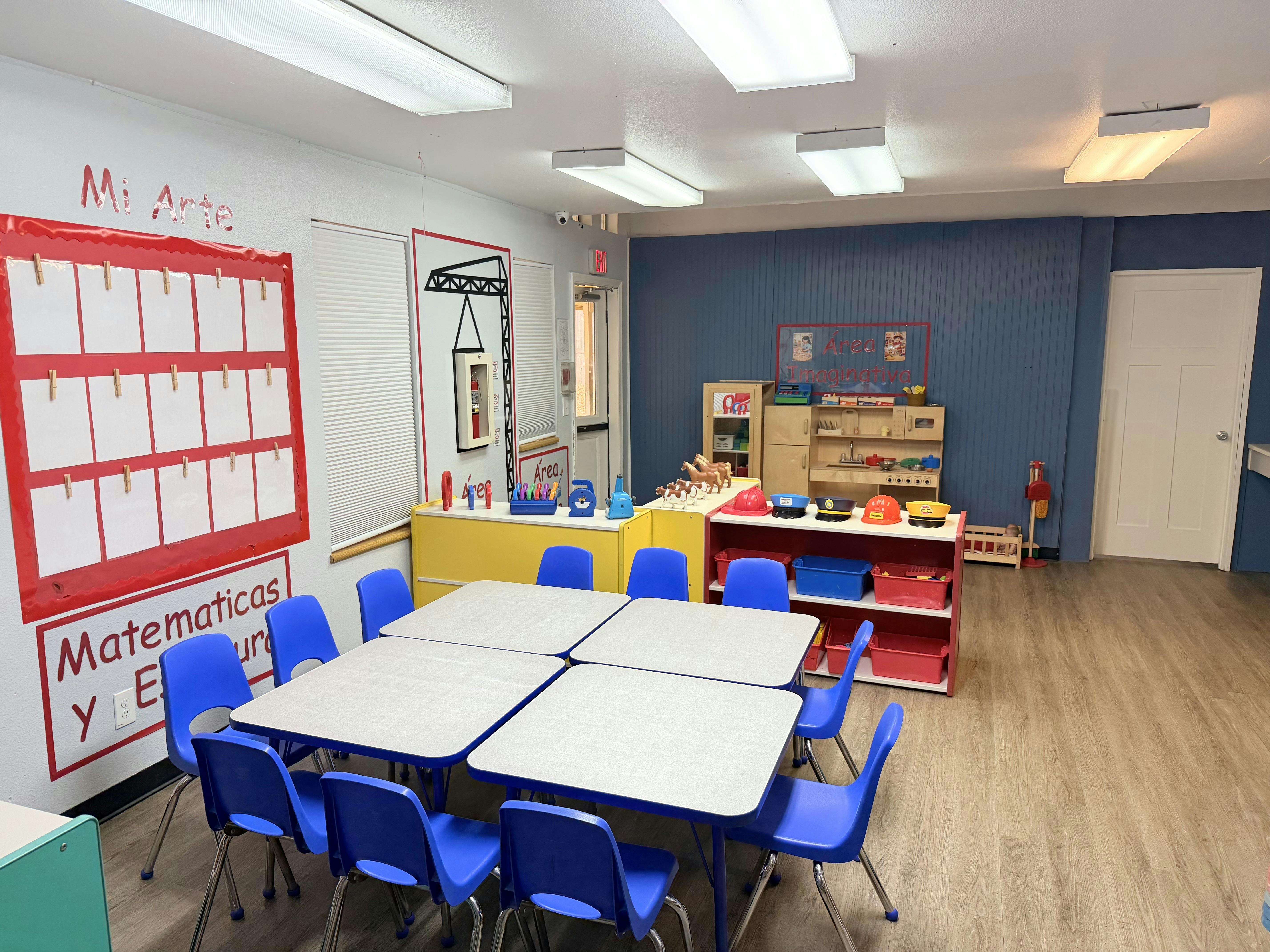 Classroom interior with small tables and chairs for children