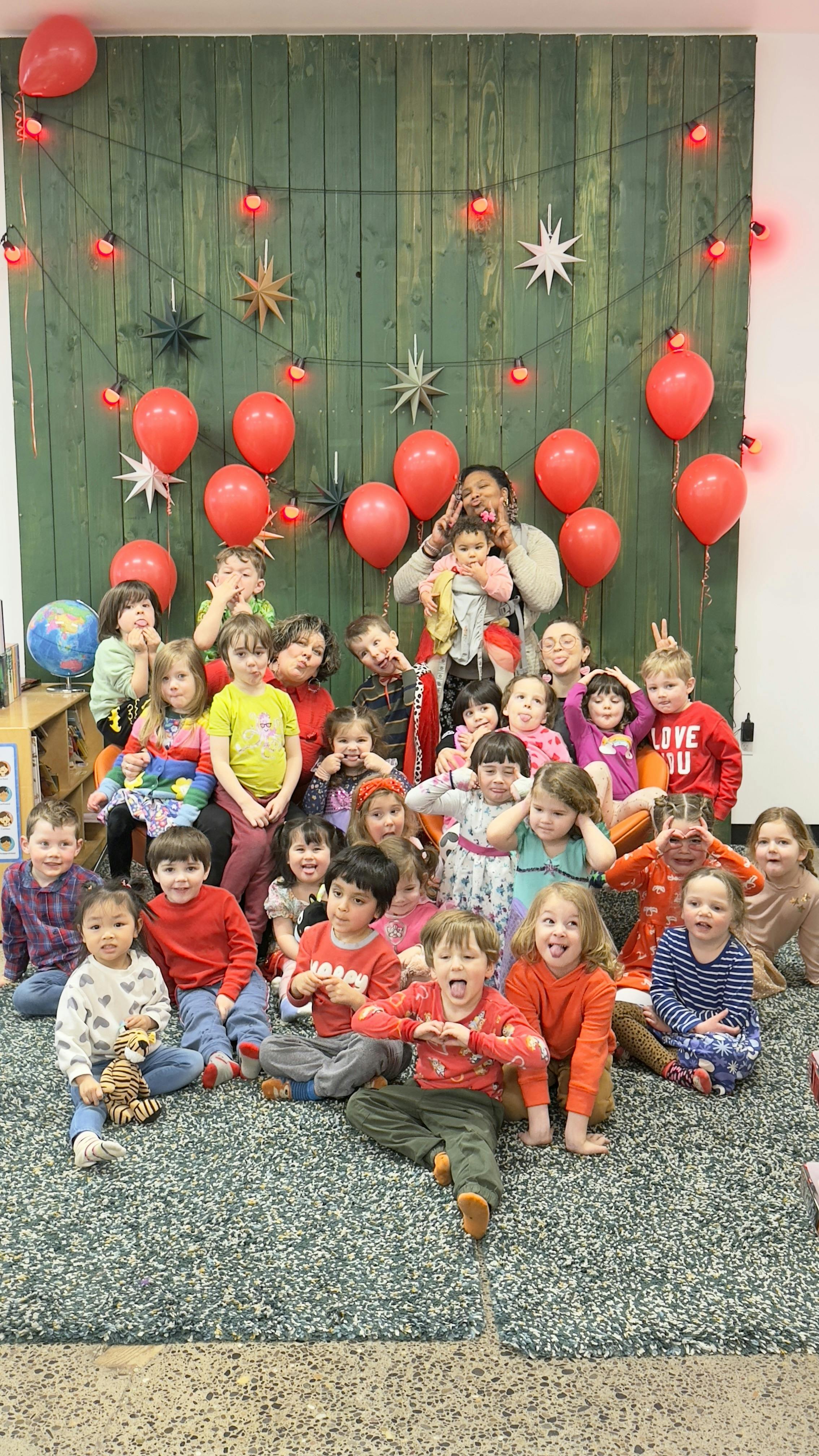Group of adults and children making funny faces