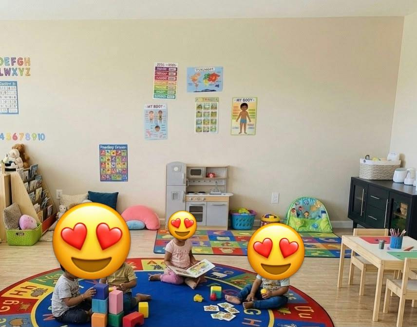 Children playing with blocks and books in a classroom