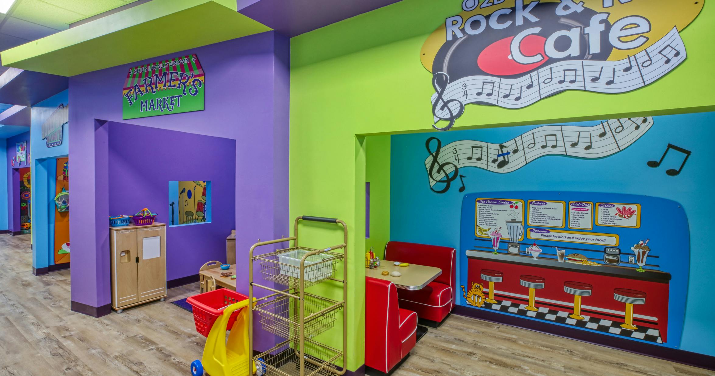 Play area for children with a rock and roll cafe and farmer's market