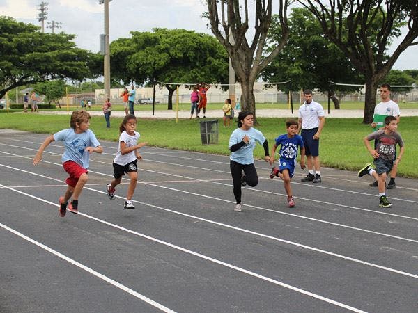 Children running on a track