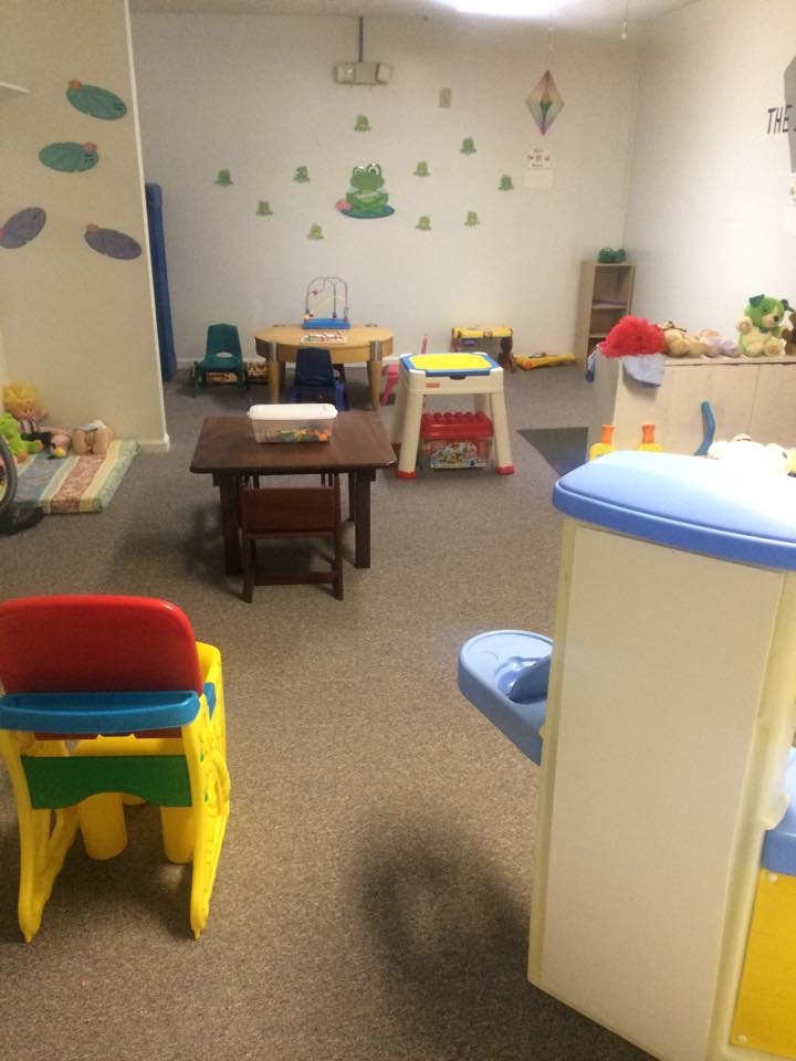 Playroom with small tables and chairs