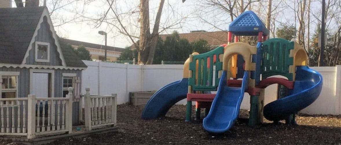 Playhouse and playground structure with slides