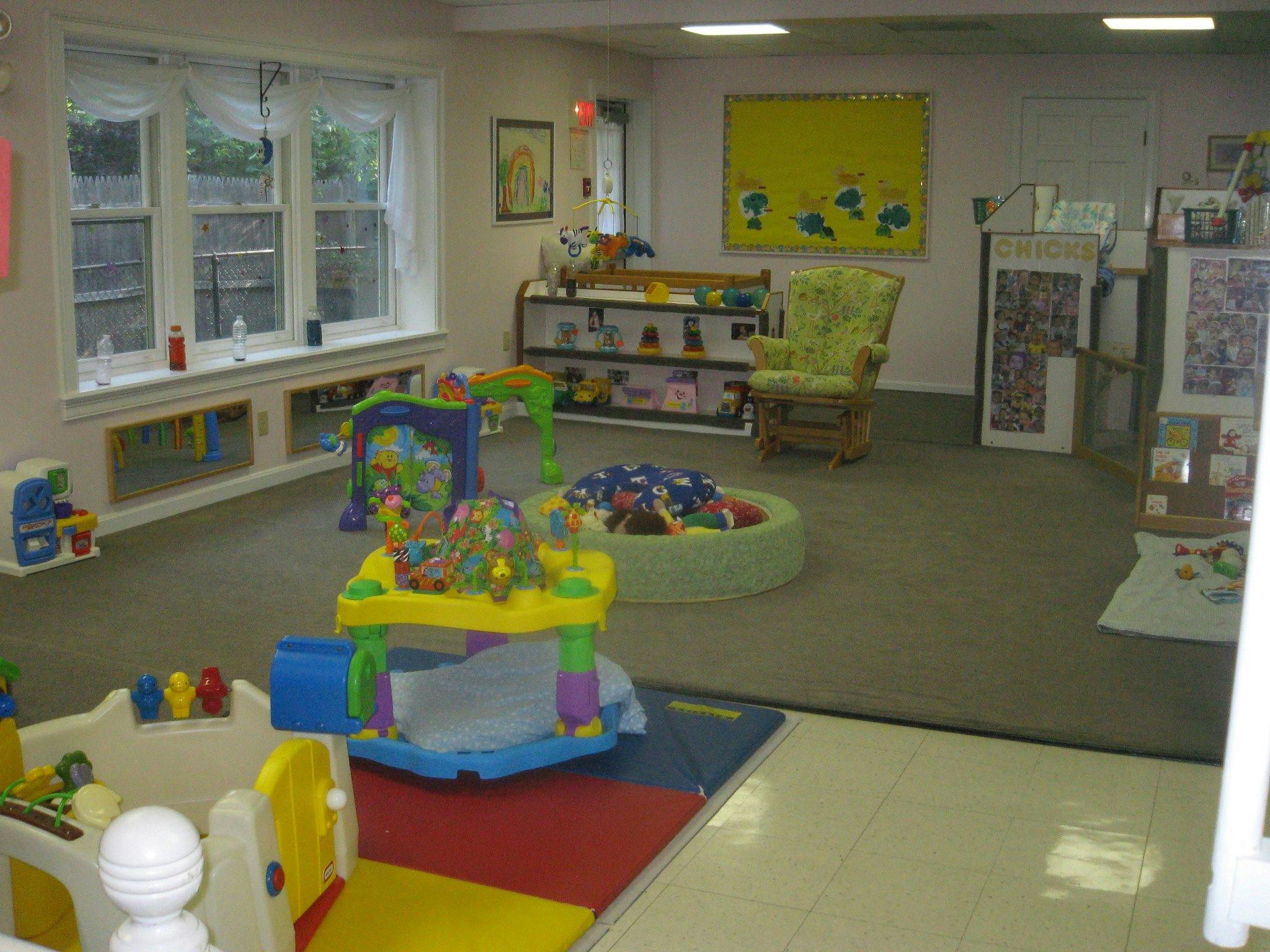 Playroom with colorful toys and a ball pit