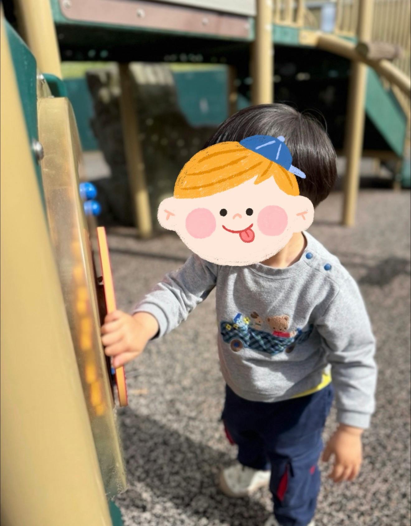 Child playing on playground equipment