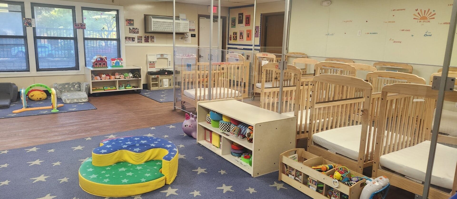 cribs in a daycare room