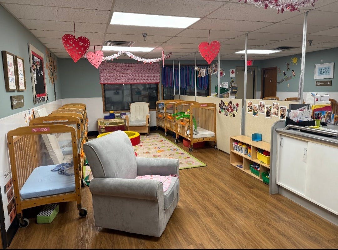 cribs in a daycare room