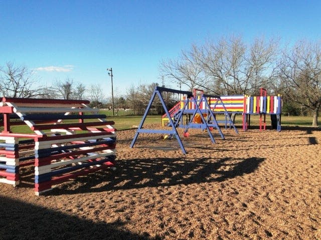 Playground with swings and climbing structures