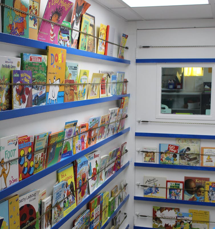 Books displayed on shelves in a room