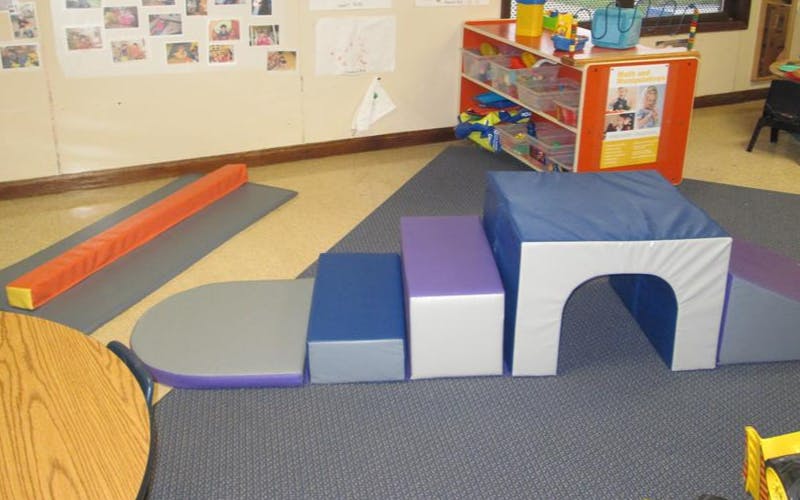 Colorful soft play equipment for children in a classroom