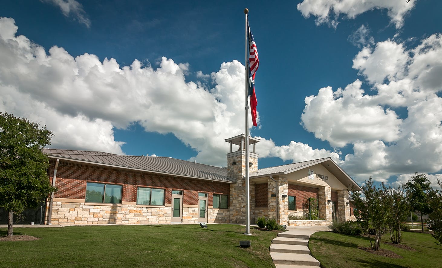 Building with a flagpole and American flag
