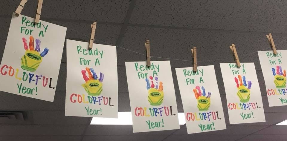 Handprint art with text "Ready for a colorful year"