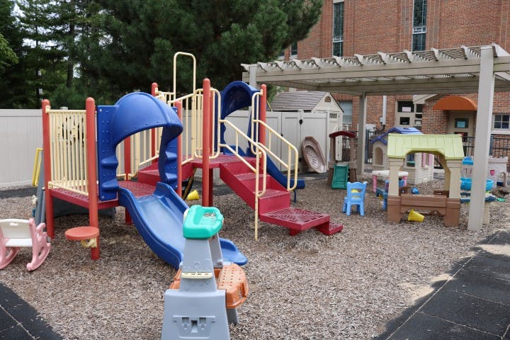 Playground with slides, stairs, and other play equipment