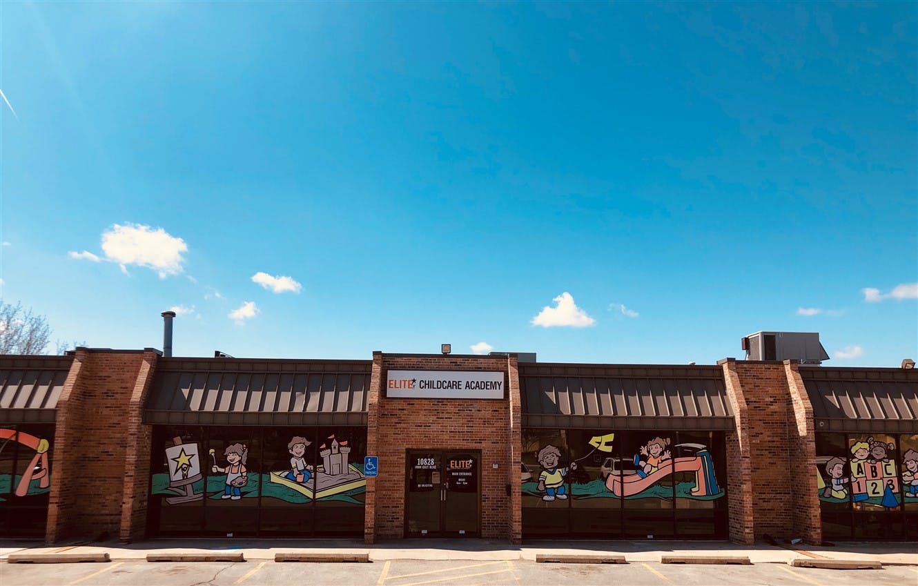 Building with painted windows under a blue sky