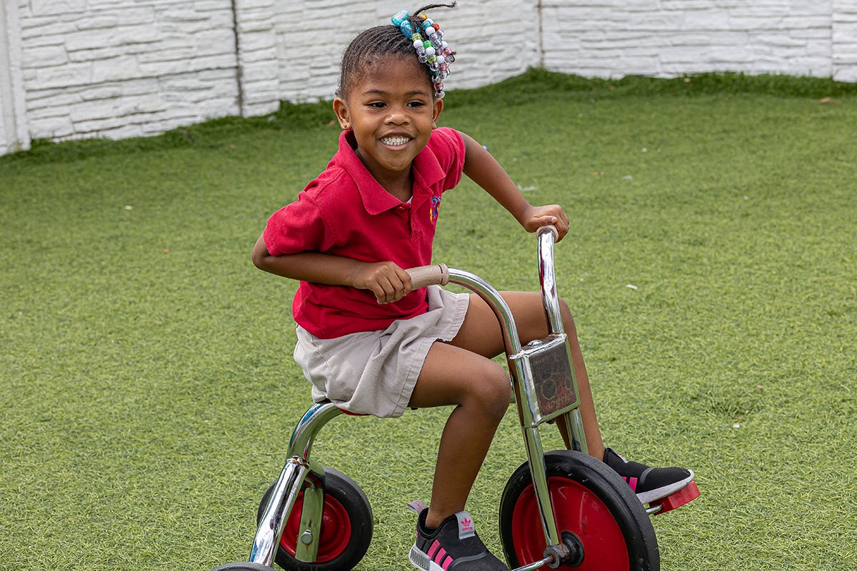 Child on a tricycle