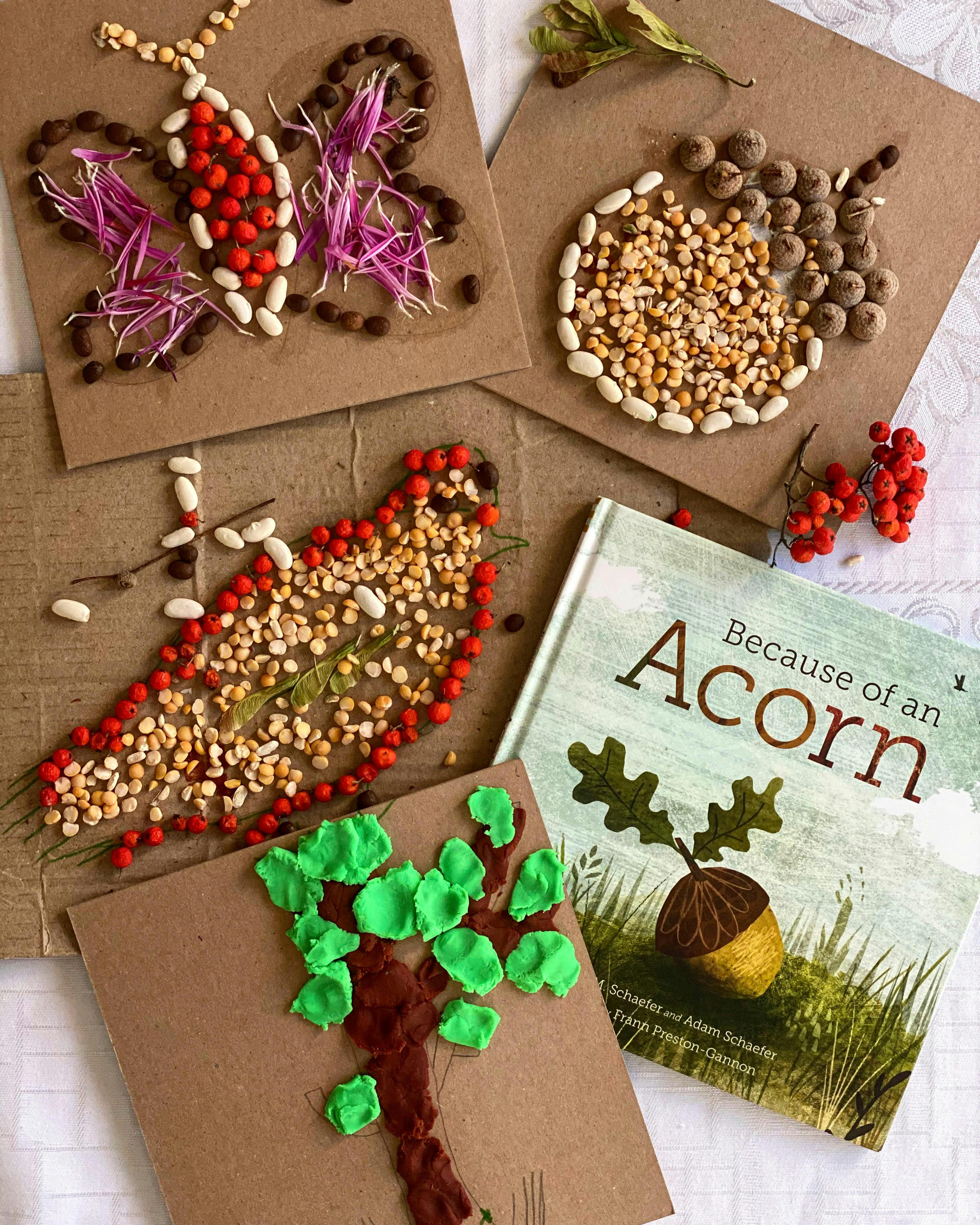 Nature-themed crafts made with seeds, petals, and clay, with a book titled "Because of an Acorn"