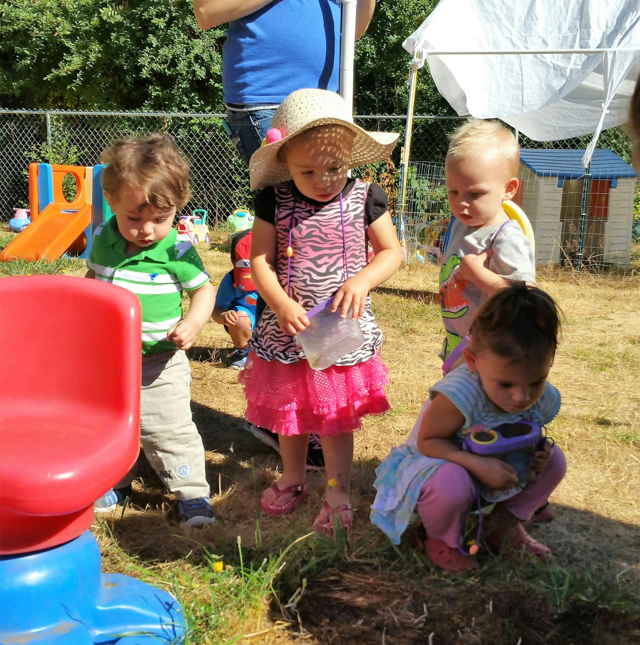 Four children playing outdoors