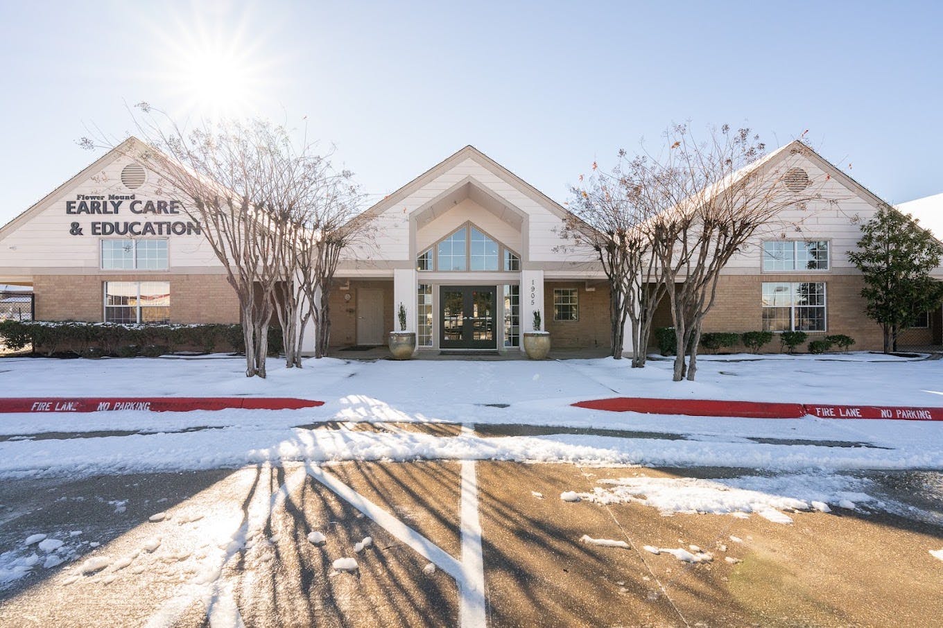 Flower Mound Early Care and Education building exterior covered in snow