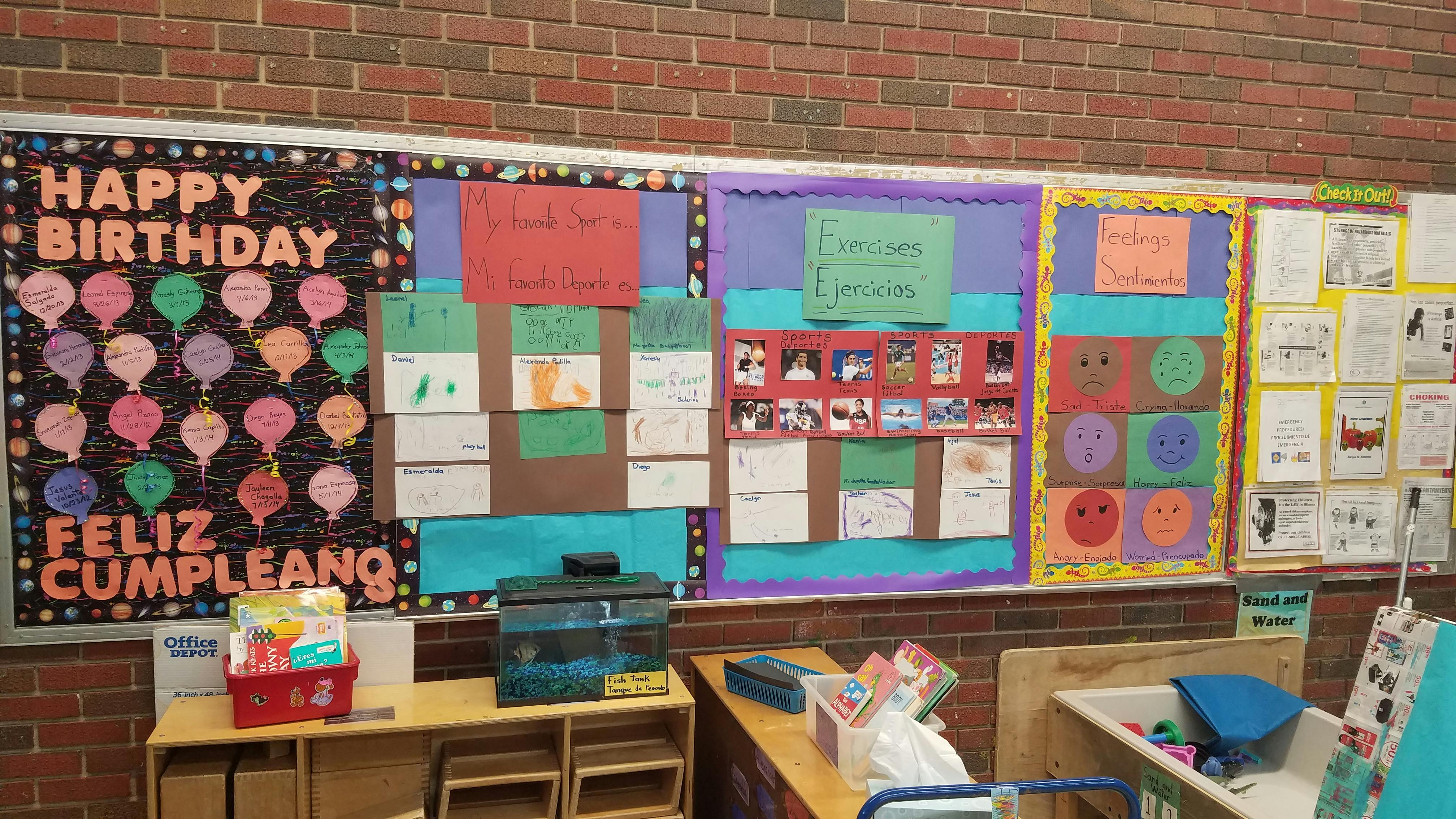 Classroom bulletin board with "Happy Birthday" display and student artwork