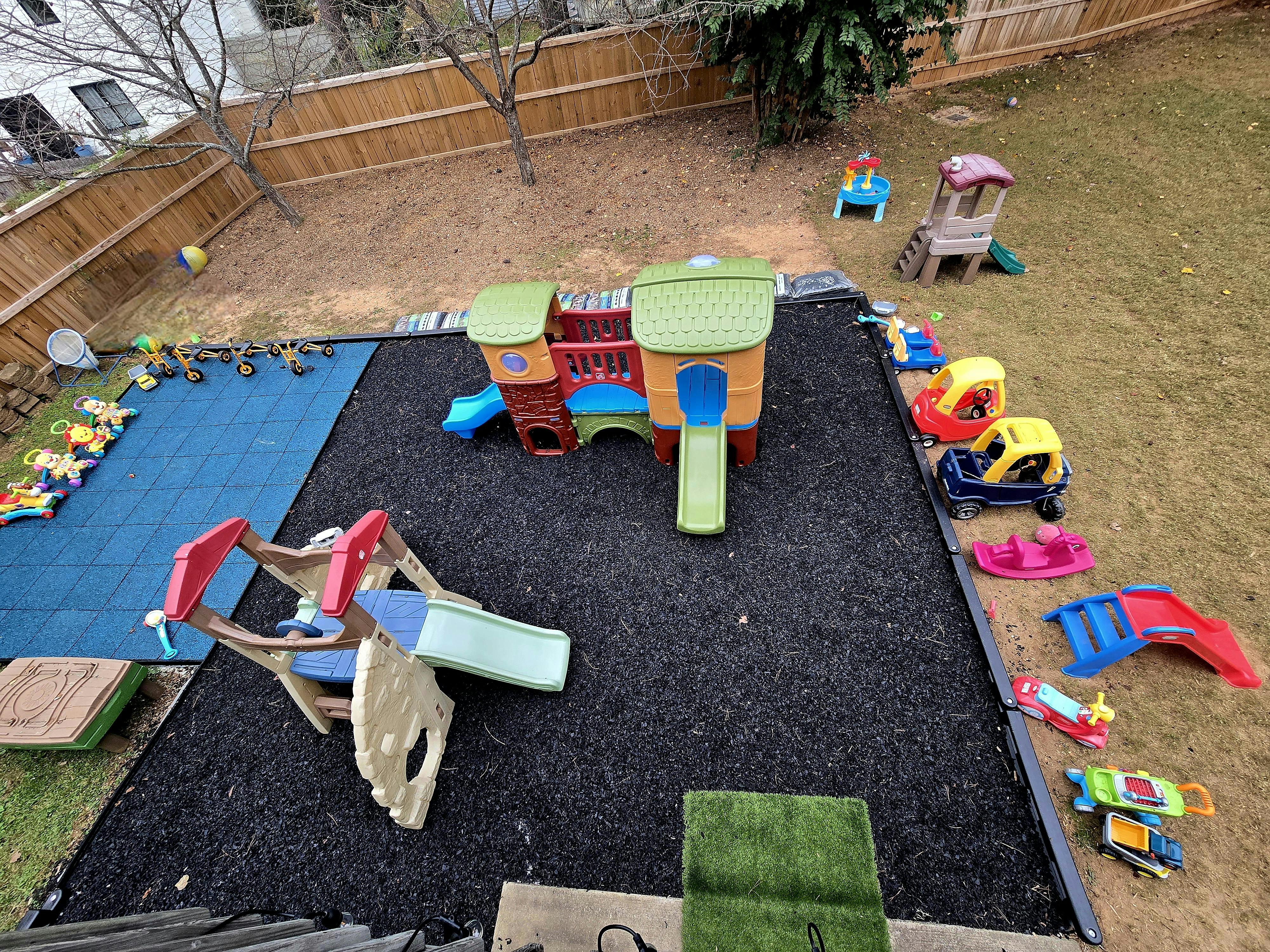 Outdoor playground with multiple slides and play structures