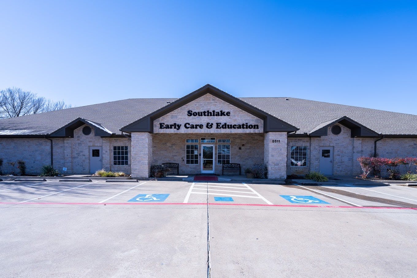 Exterior of Southlake Early Care and Education building with parking lot
