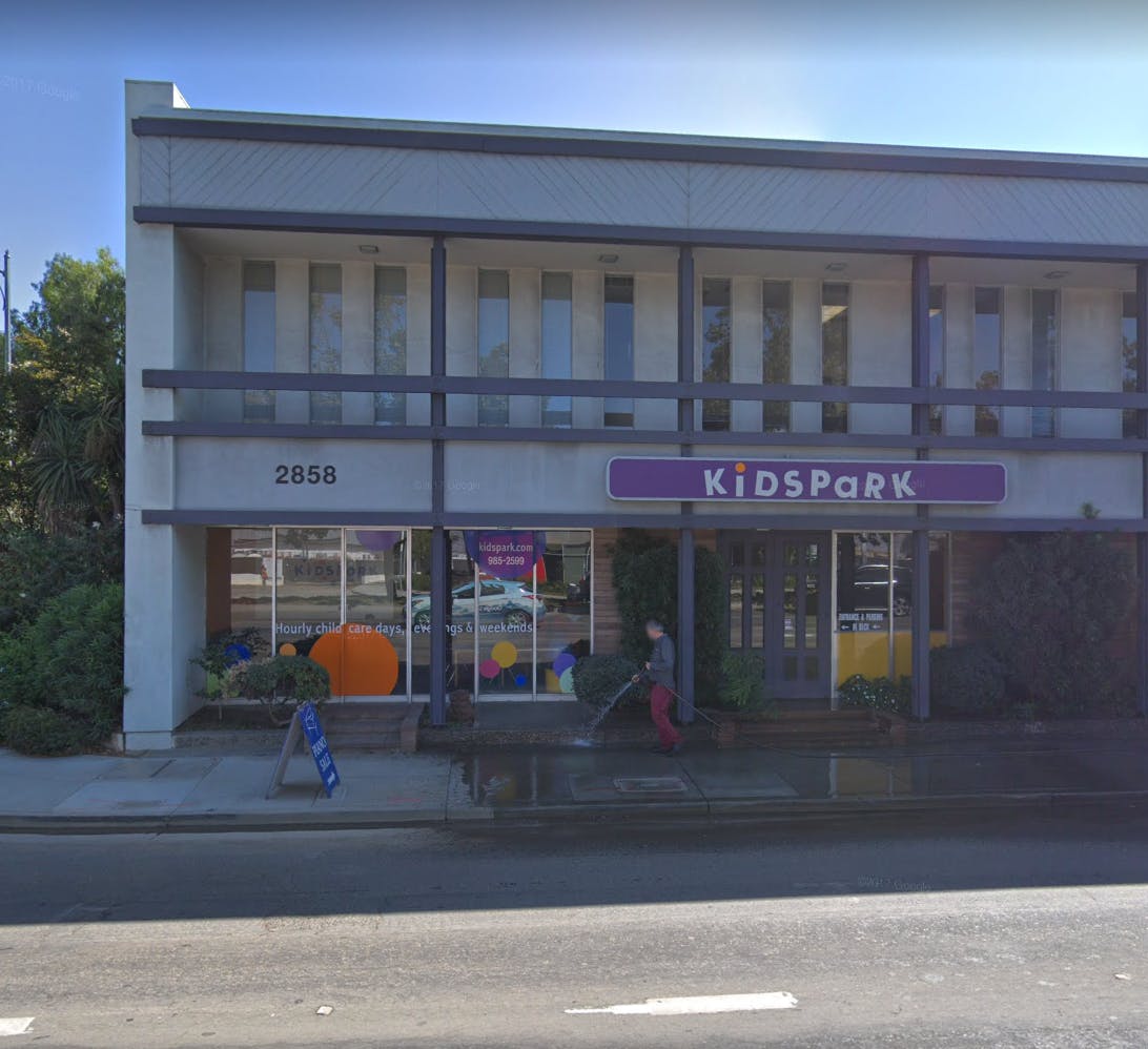 Building with a "KidsPark" sign above the entrance
