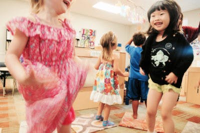 Children playing in a classroom
