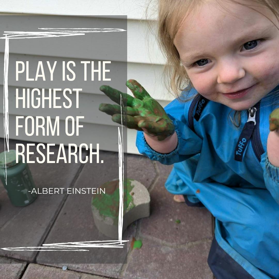 Child with hands covered in green paint, text "PLAY IS THE HIGHEST FORM OF RESEARCH"