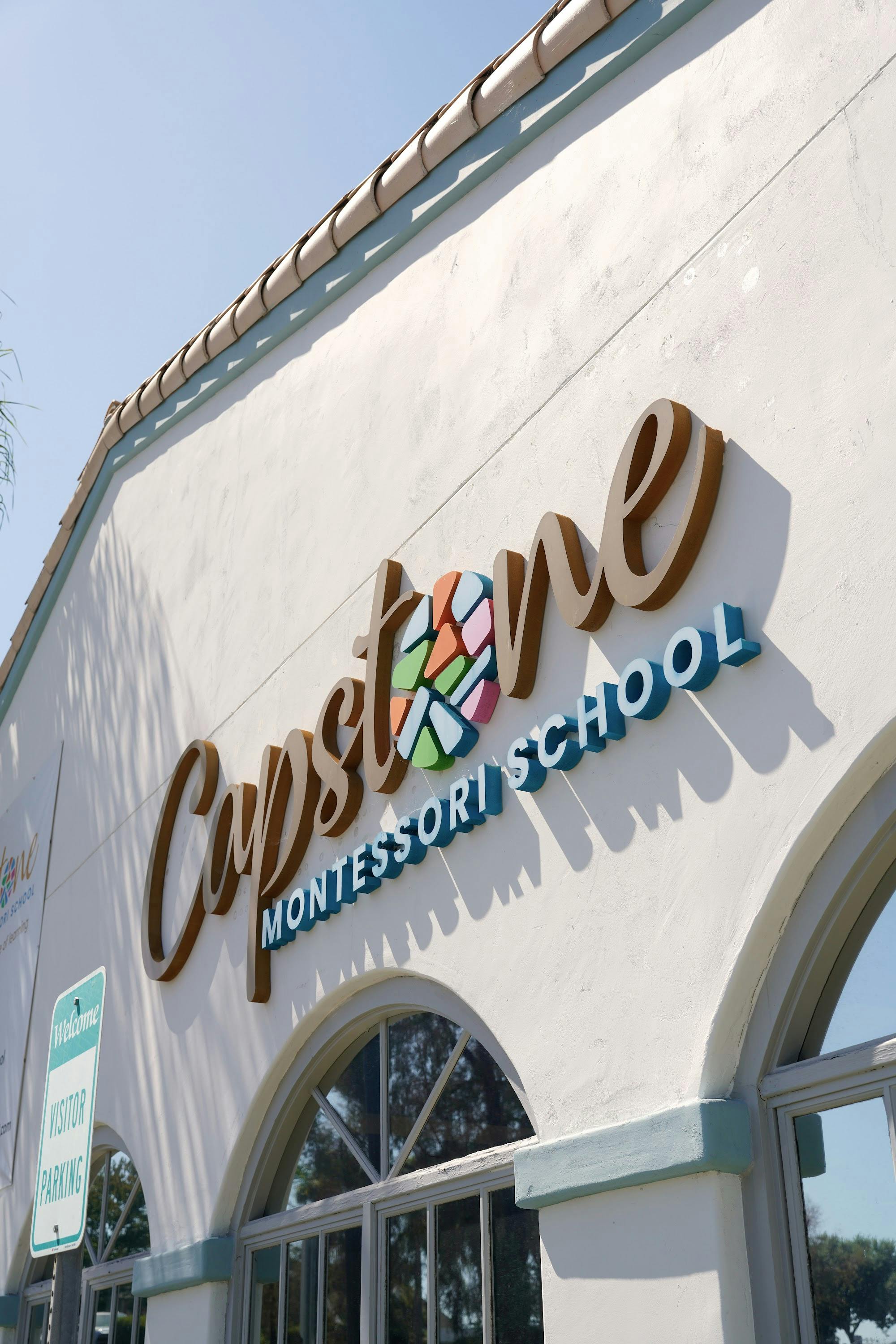 Capstone Montessori School sign on an exterior building wall