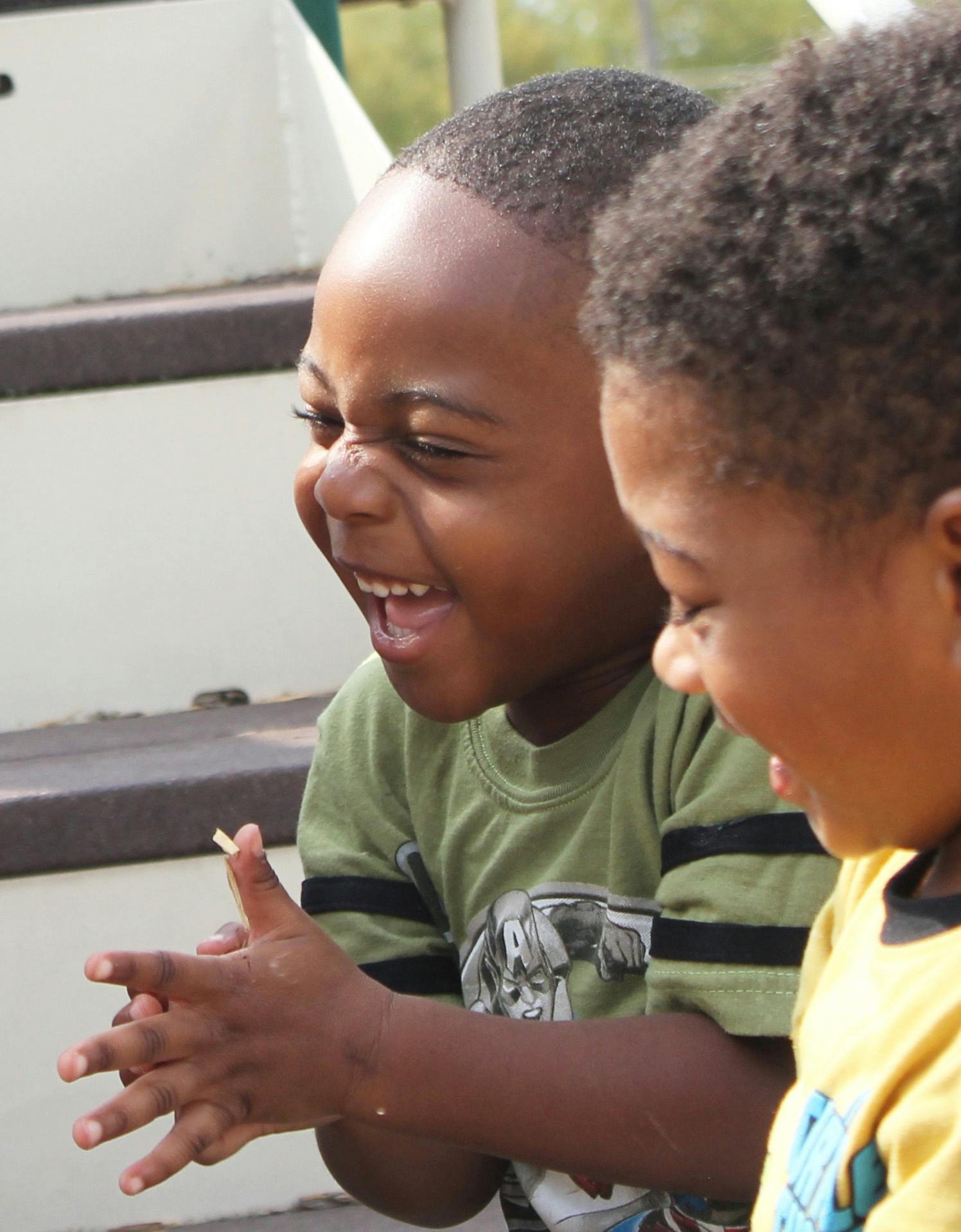 Two children laughing
