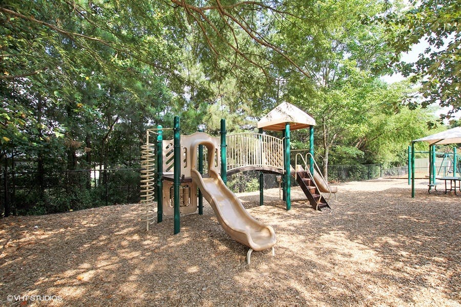Playground with slides and climbing structures