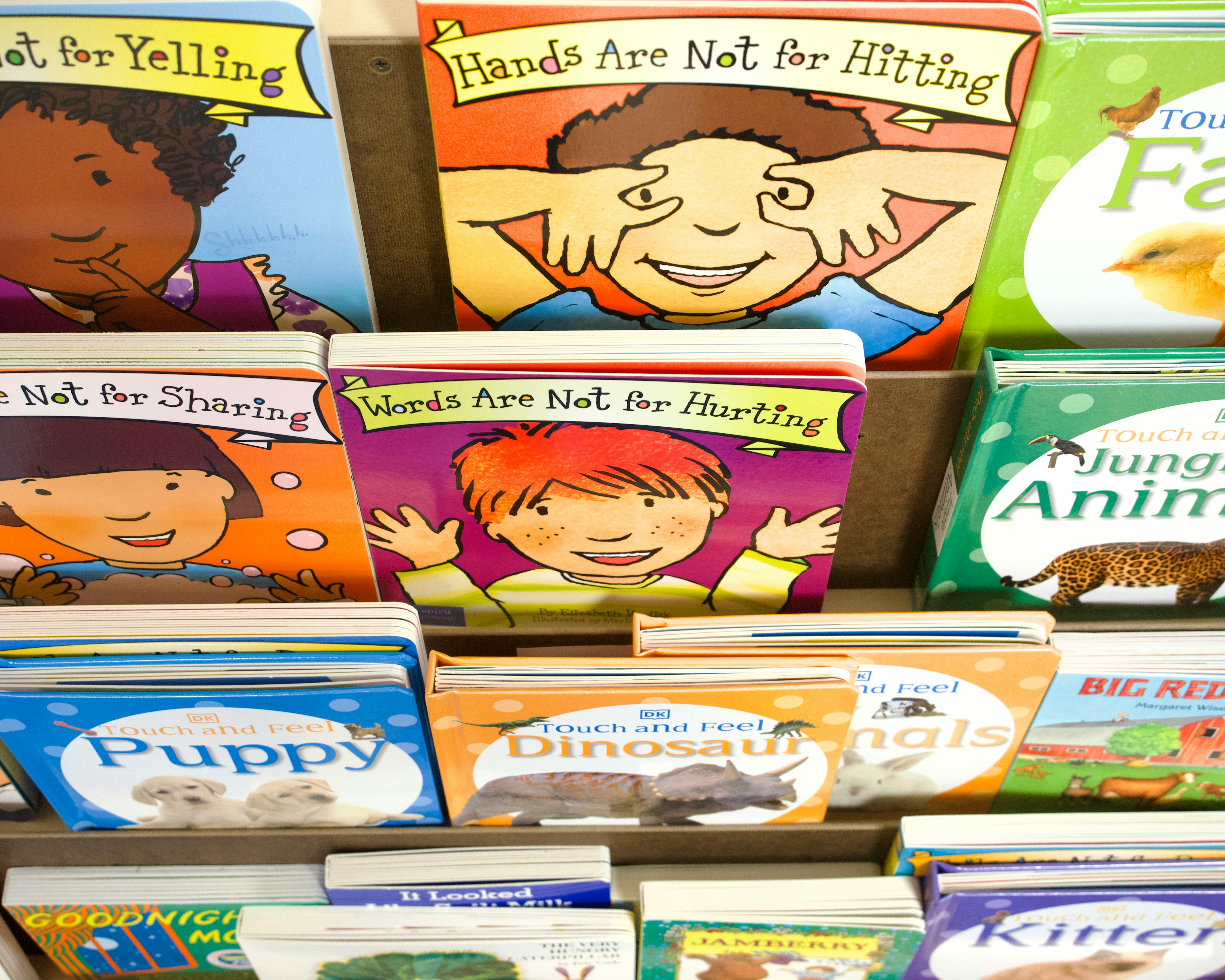 Children's books with titles like "Hands Are Not for Hitting" and "Words Are Not for Hurting"