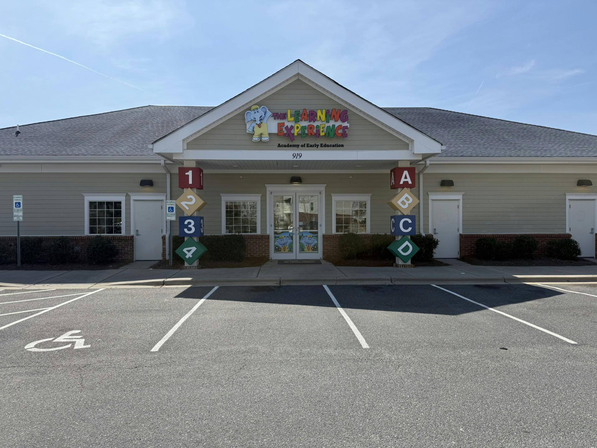 Childcare center building with "The Learning Experience" sign