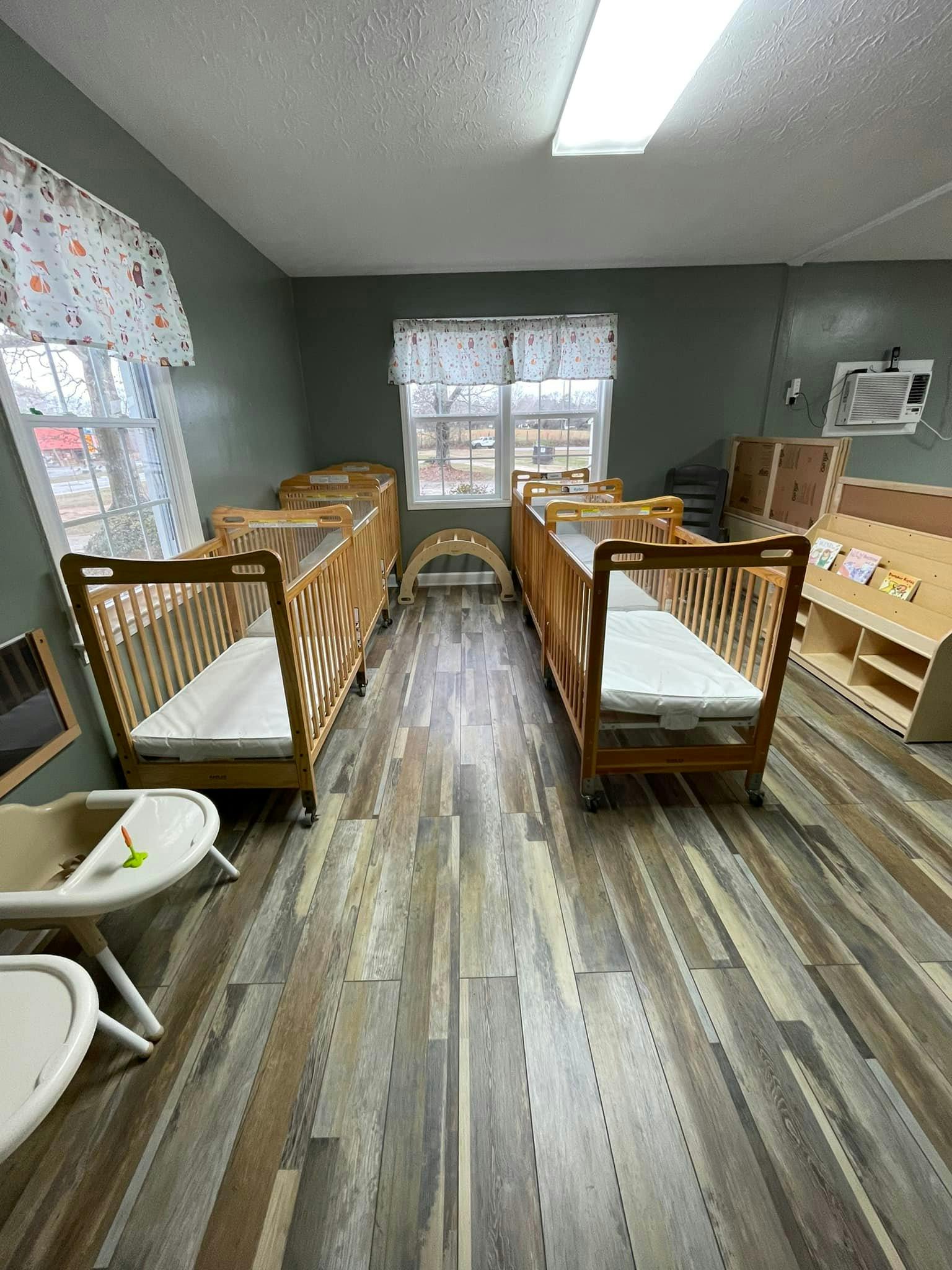 cribs in a room