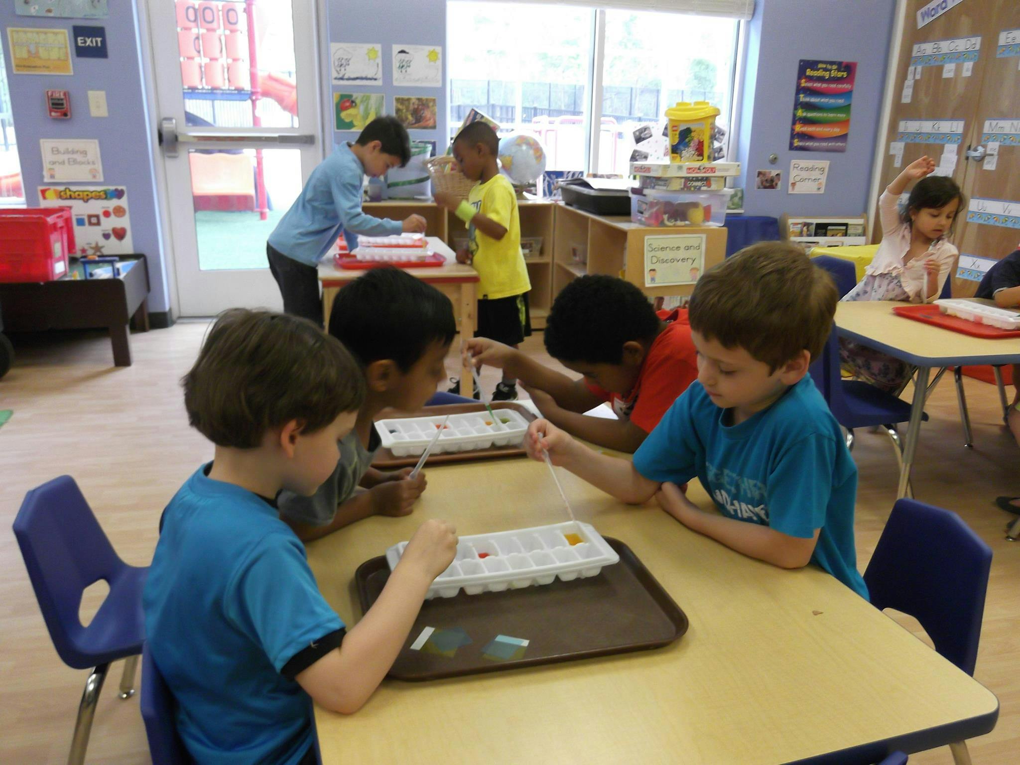 Children at tables in a classroom