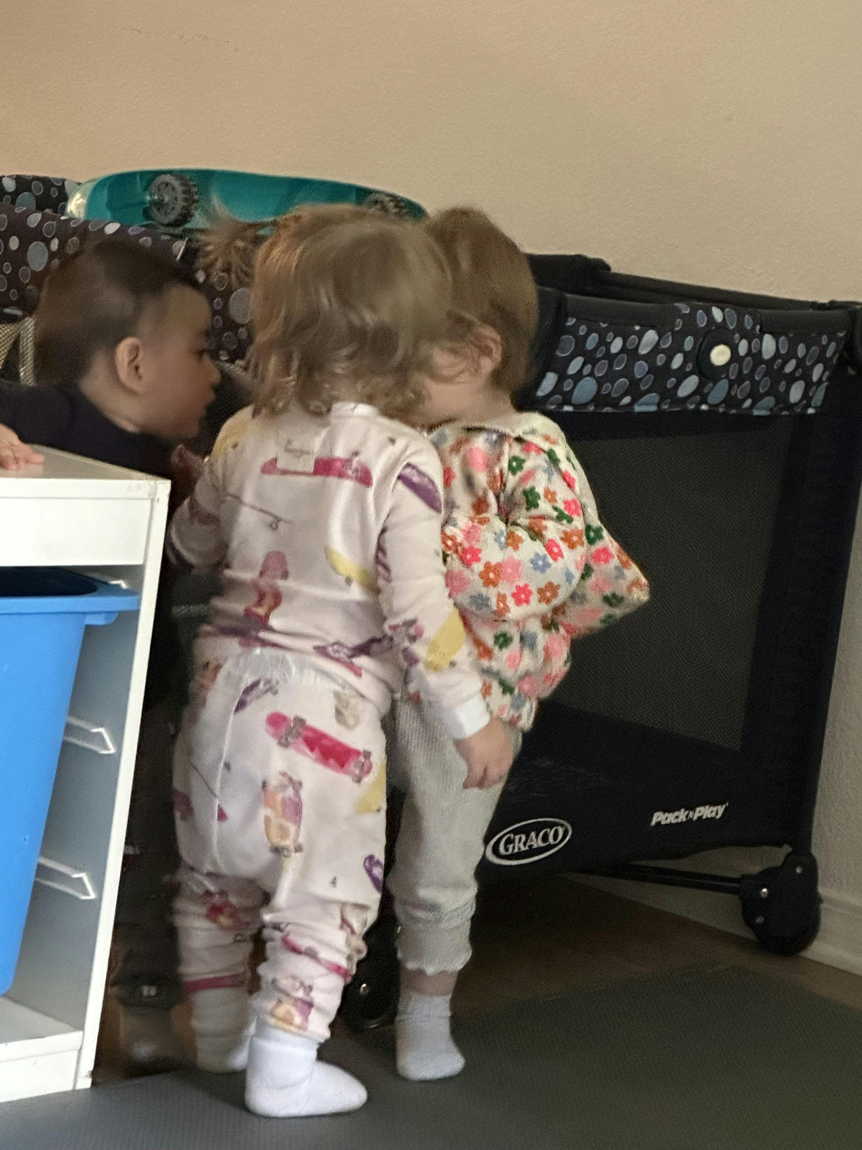 Three children standing together