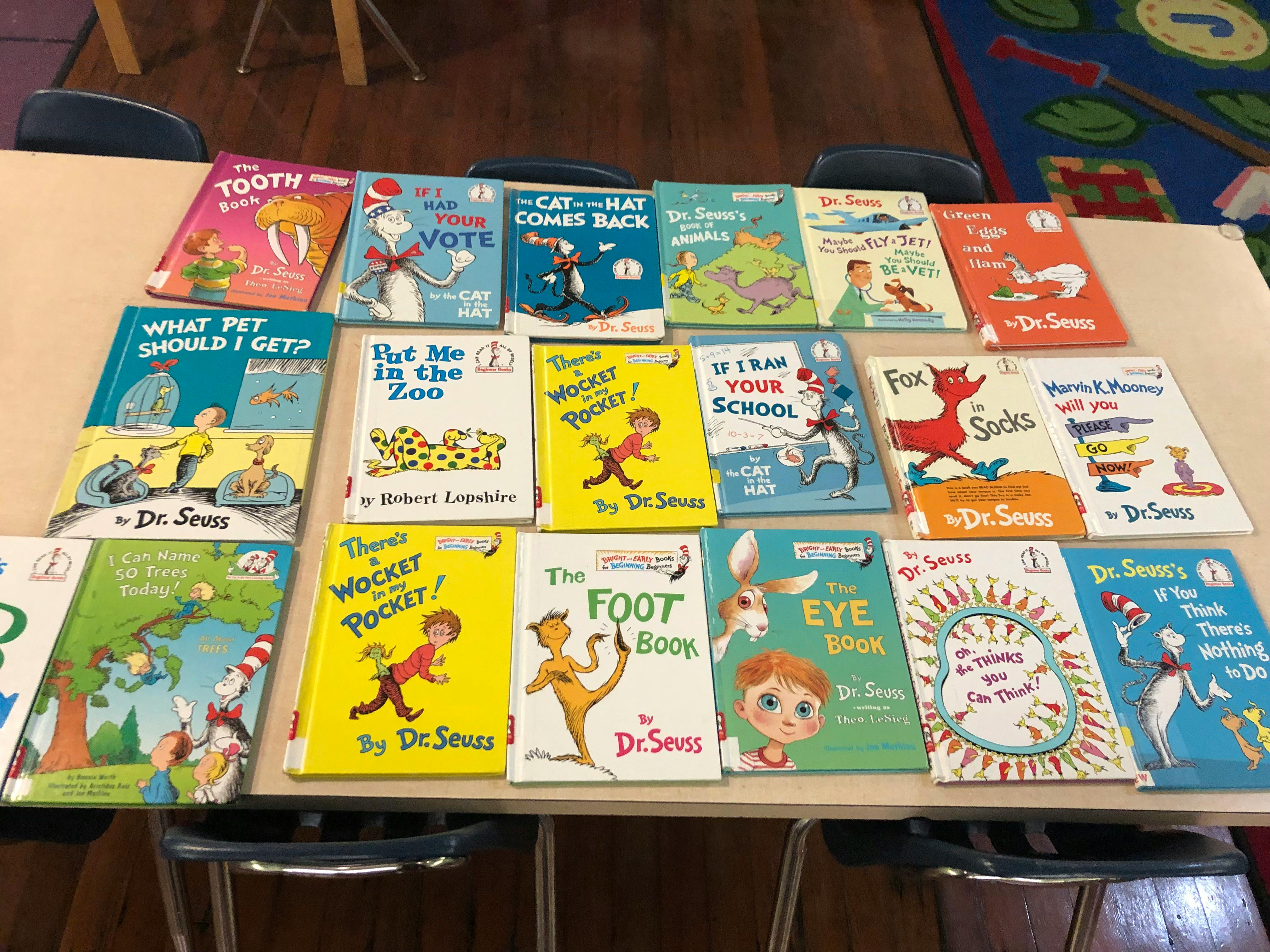 Collection of Dr. Seuss books displayed on a table