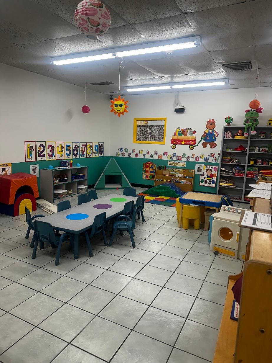 Classroom interior with small tables and chairs for children