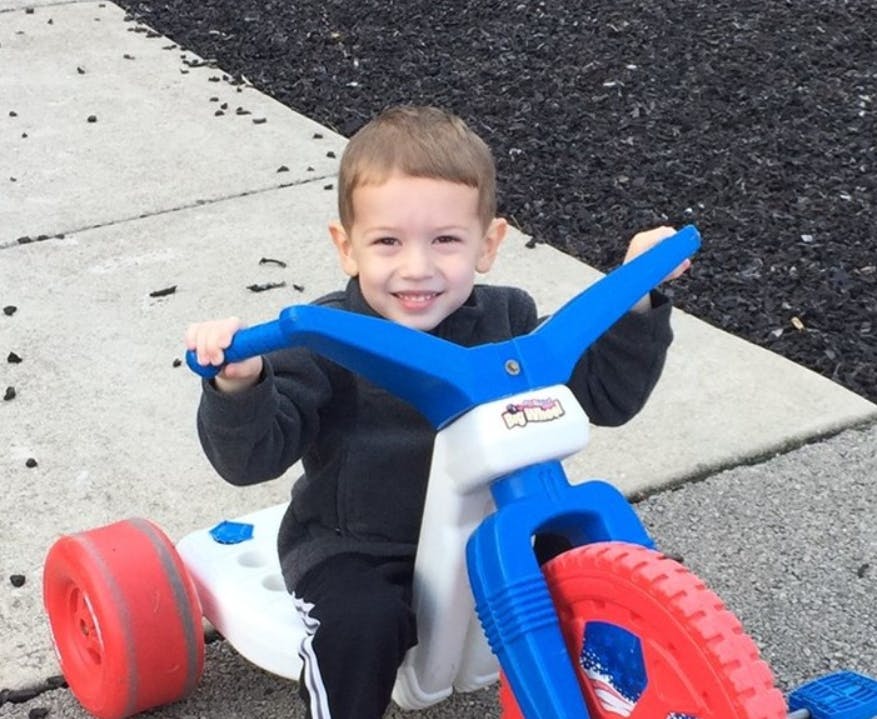 Child on a tricycle