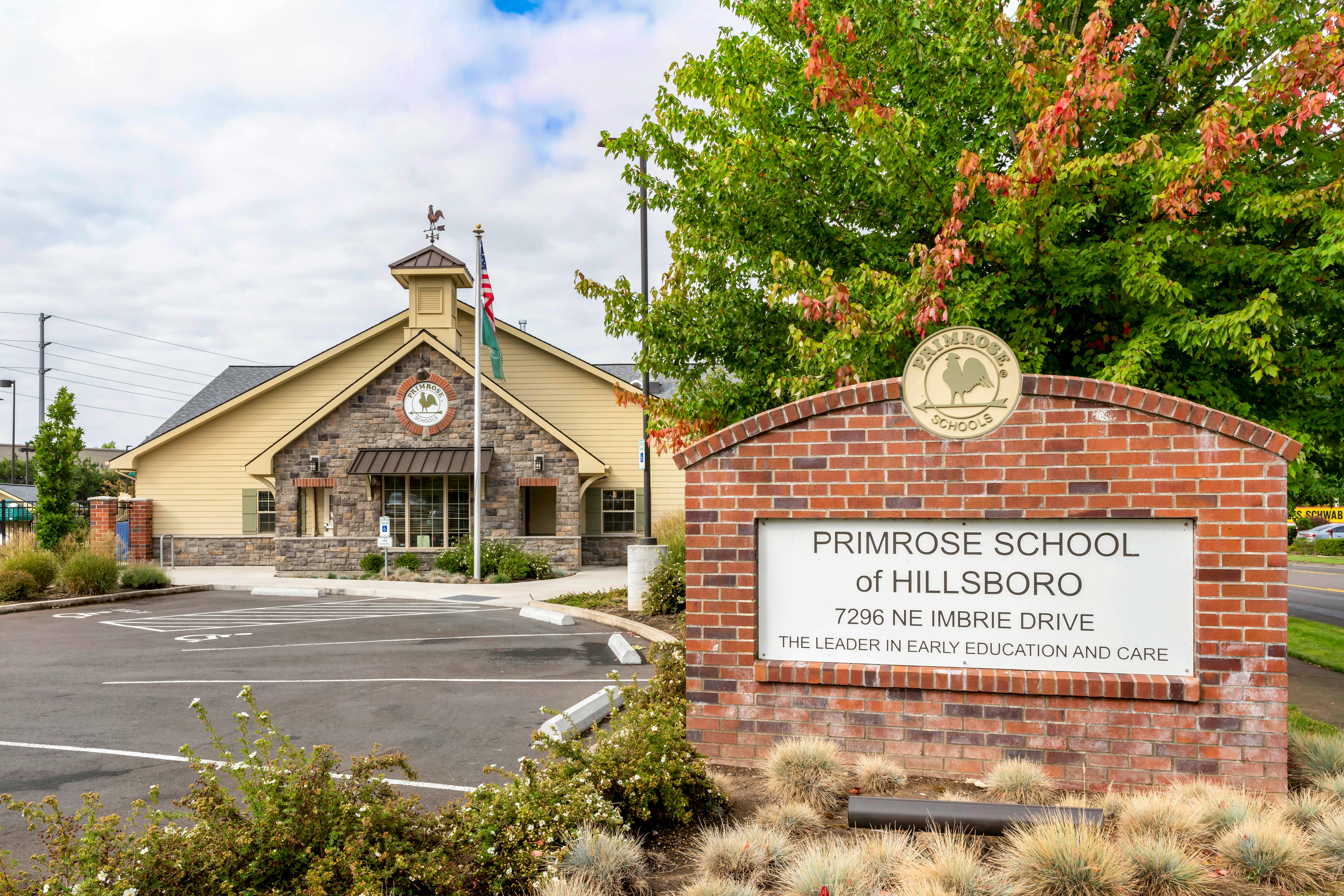 Primrose School of Hillsboro building with a sign for the school in front