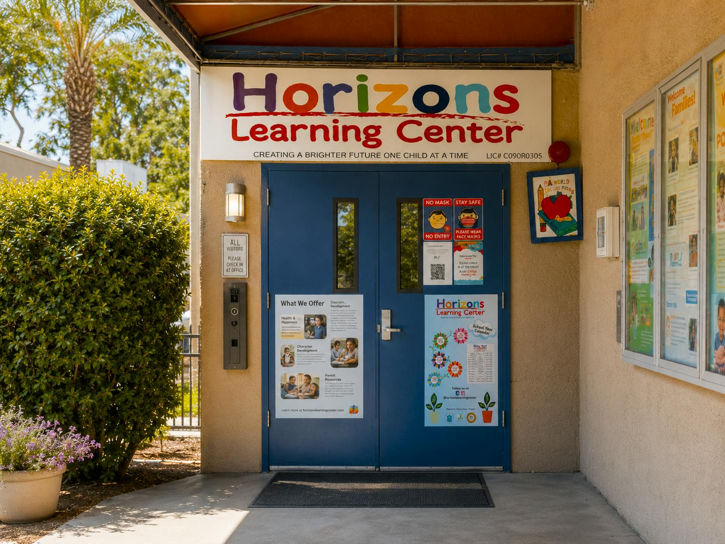 Entrance to Horizons Learning Center with informational signage on double doors