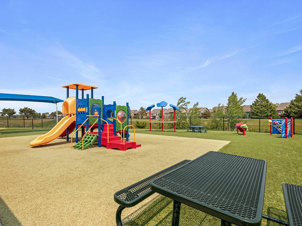 Colorful playground with slides and structures on a sunny day