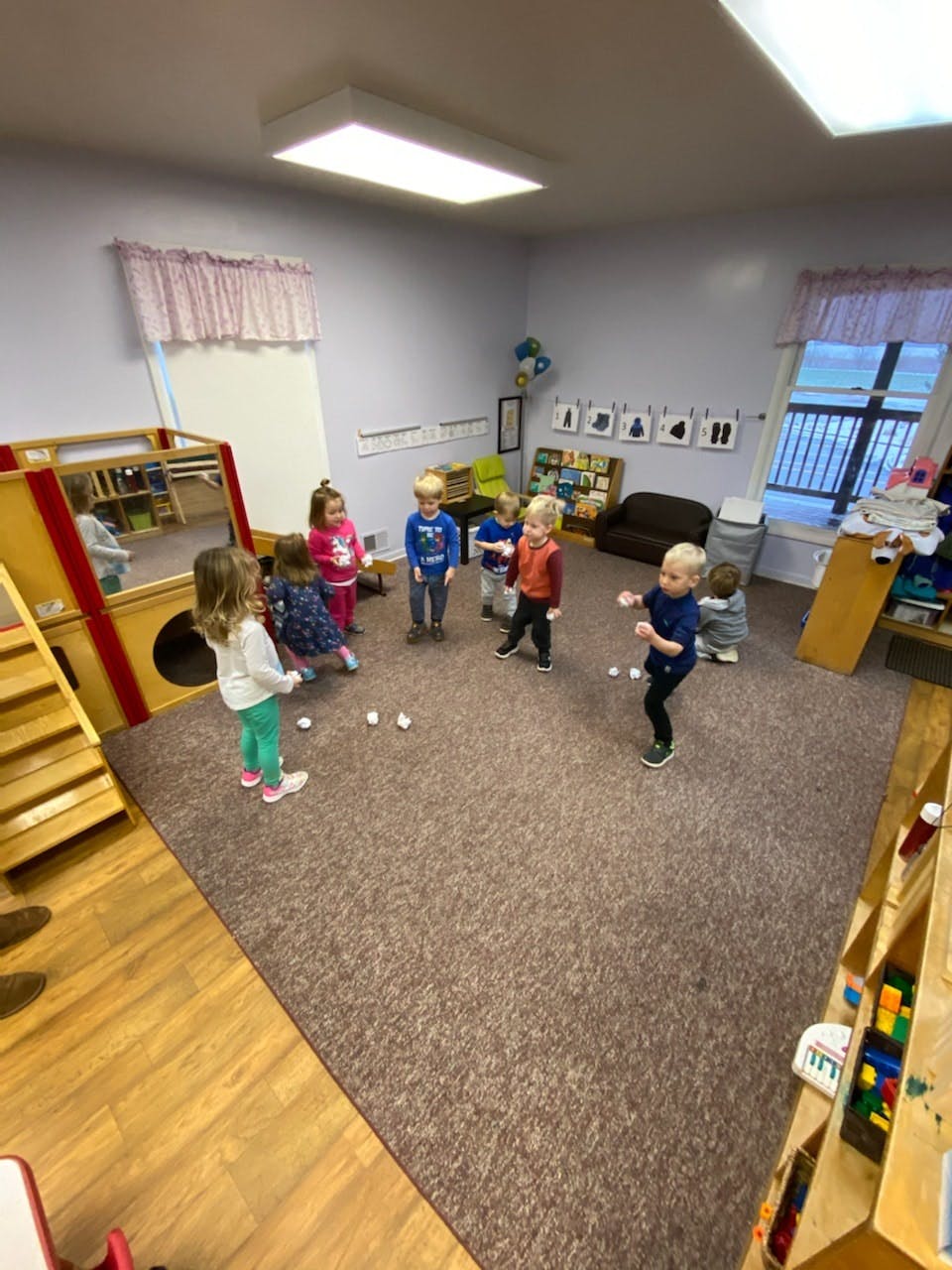 Children playing in a classroom