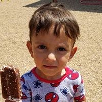 Child holding an ice cream bar