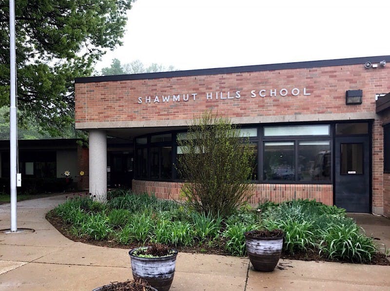 Shawmut Hills School building exterior with landscaping