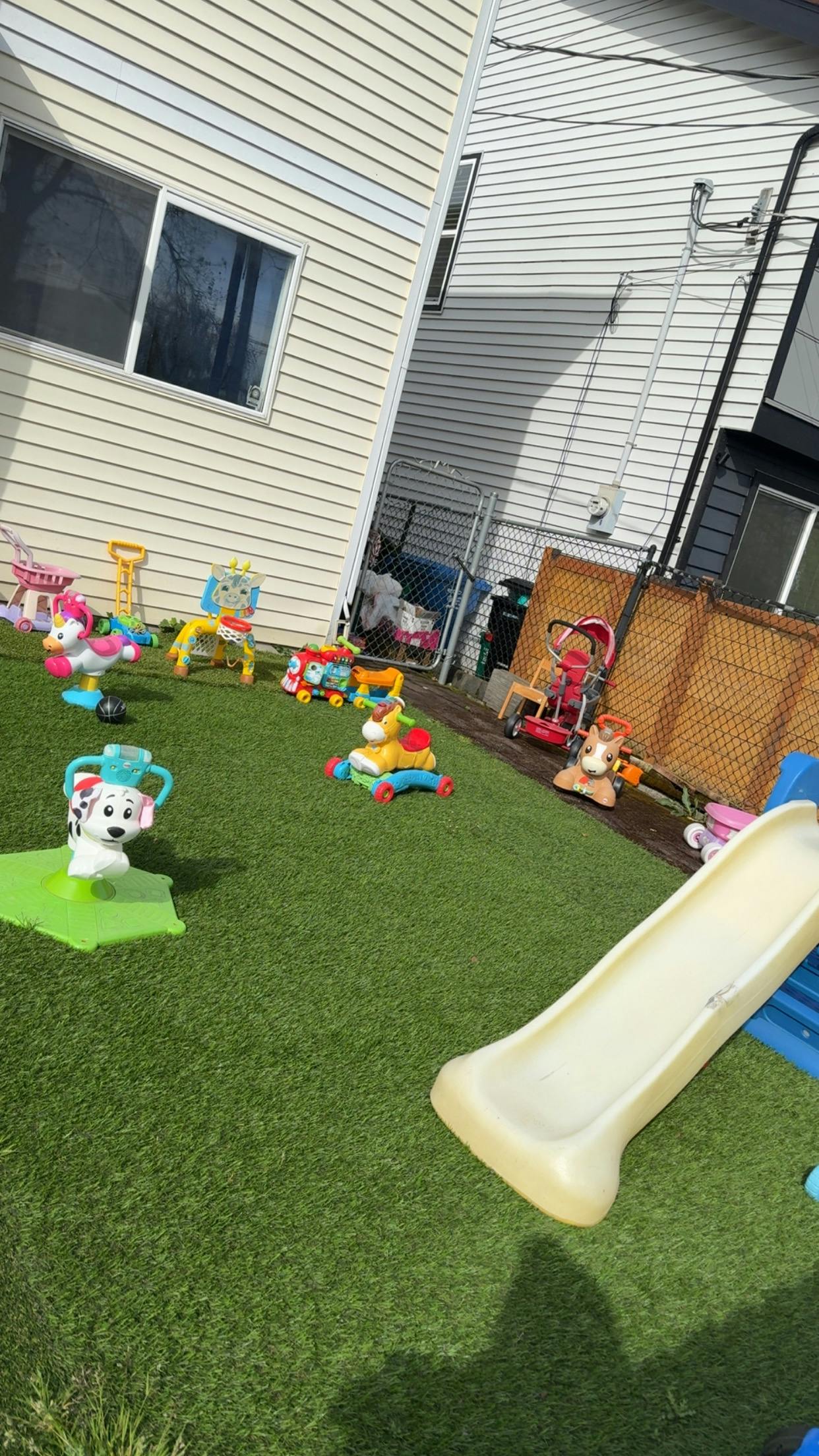 Playground with various toys on artificial grass