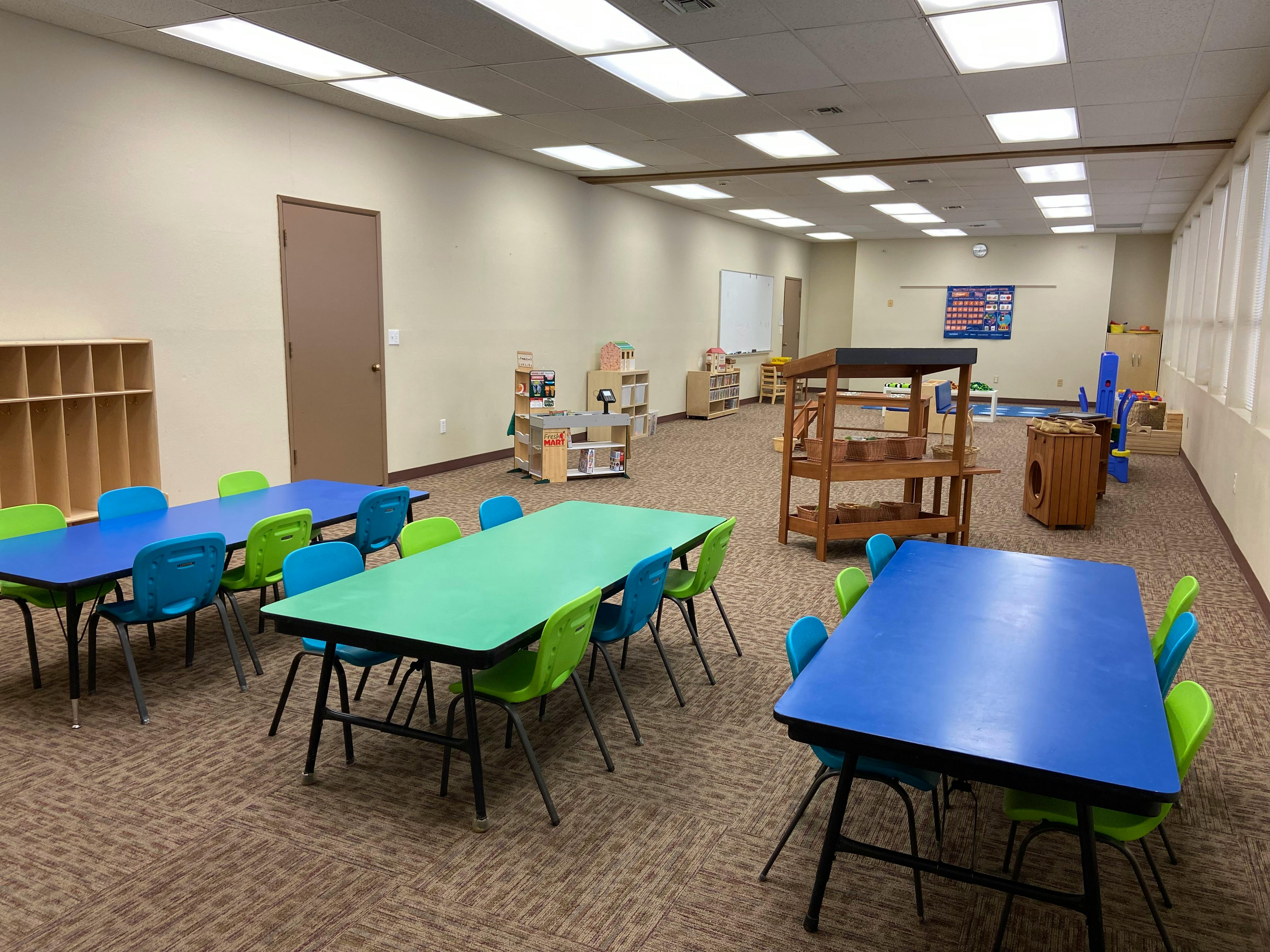Classroom with multiple tables and chairs