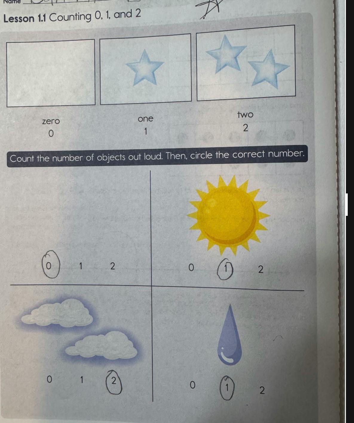 Math worksheet for counting zero, one, and two with stars, sun, clouds, and a raindrop
